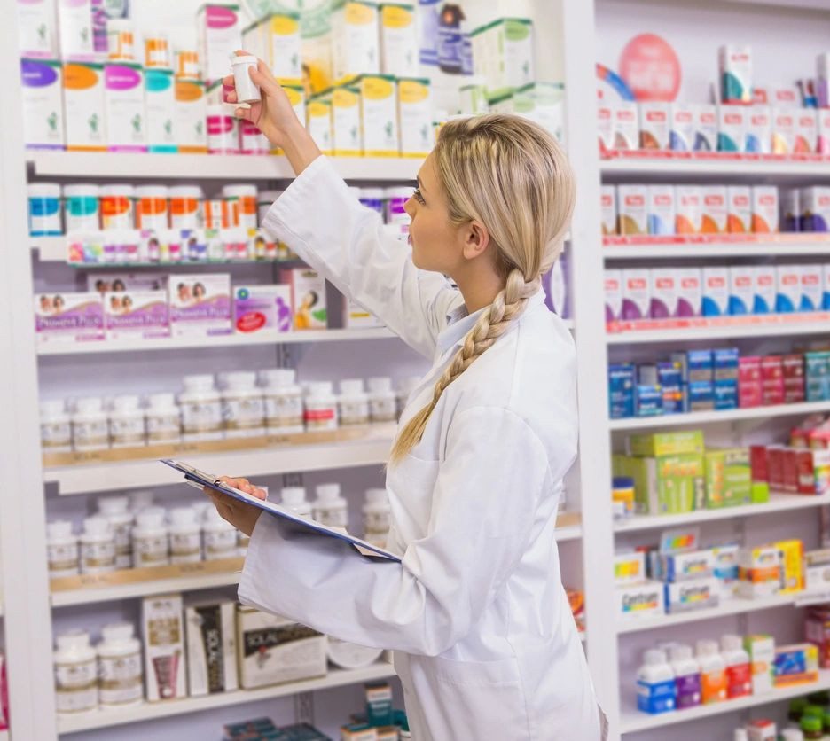 Woman Working a Pharma Store